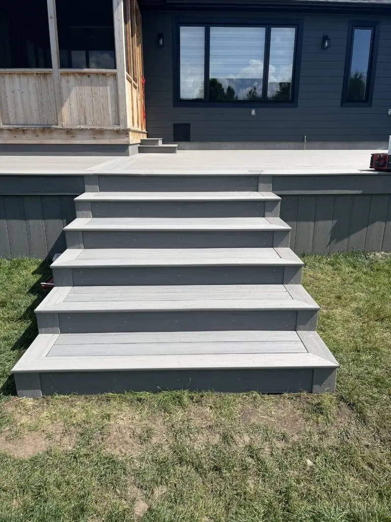 Kanata composite deck stairs with picture framed steps