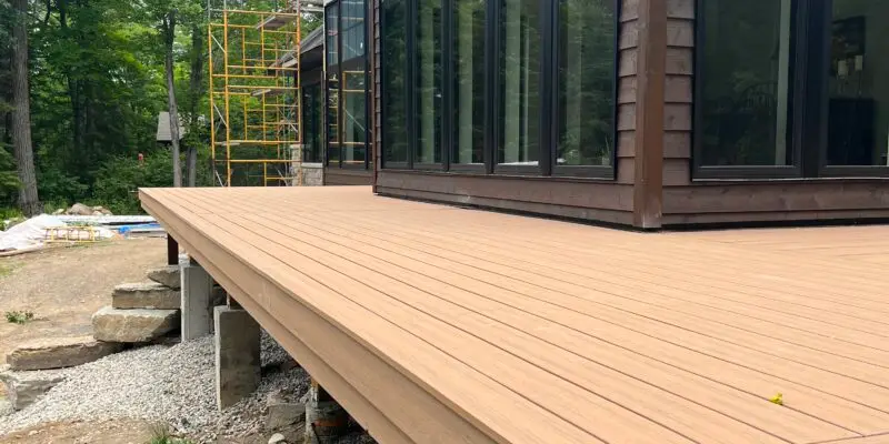 A 2 step fascia with a picture framed border looks great on this composite deck
