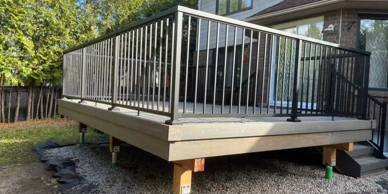 A Kanata composite deck installed with a picture frame border