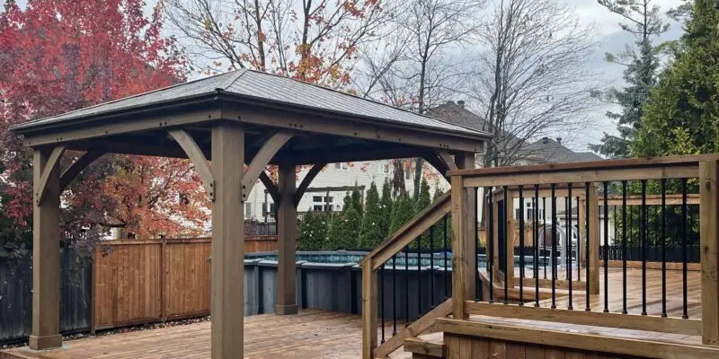 A Kanata multi level deck contractrator builds this pool deck with gazebo