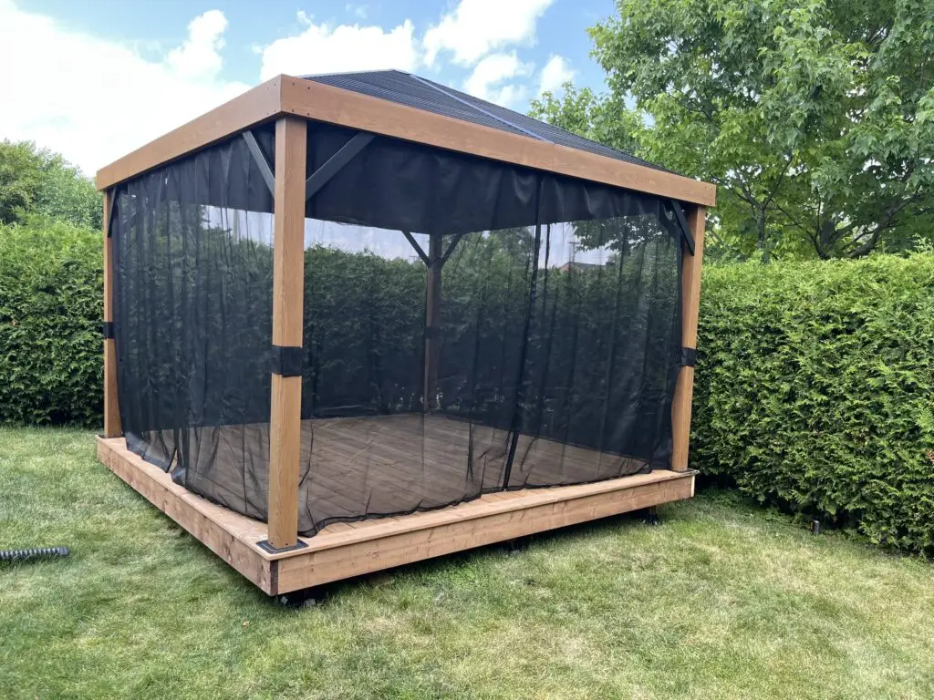 An Ottawa wood deck built our of pressure treated wood with a screened gazebo