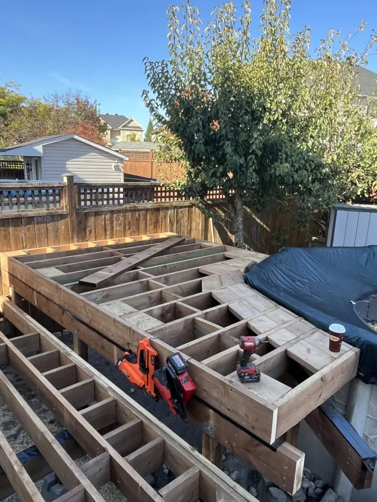Framing around the pool deck to install curved PVC deck boards