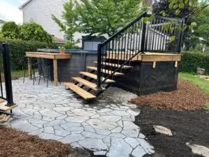 Pool deck in Gloucester with aluminum railing